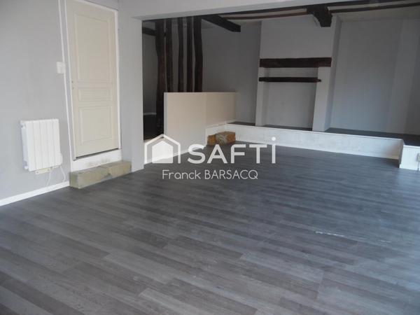ENSEMBLE IMMOBILIER SITUE EN BOURG CENTRE