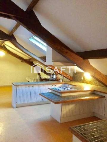 ENSEMBLE IMMOBILIER SITUE EN BOURG CENTRE