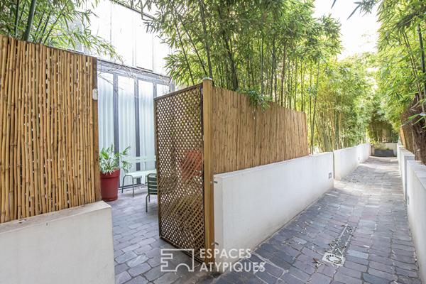 Loft en duplex avec terrasse arborée