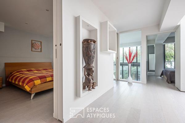 Loft en duplex avec terrasse arborée