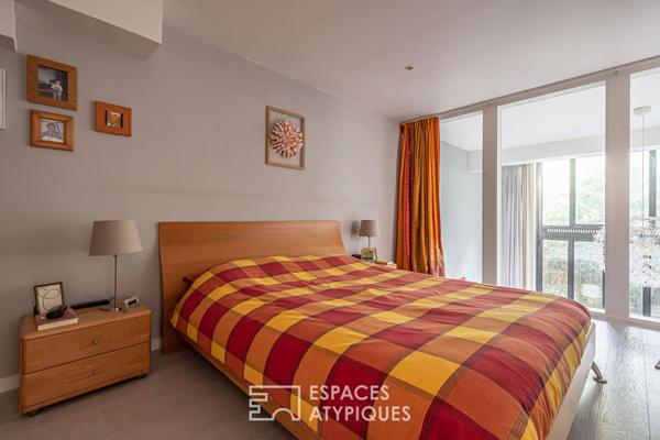 Loft en duplex avec terrasse arborée