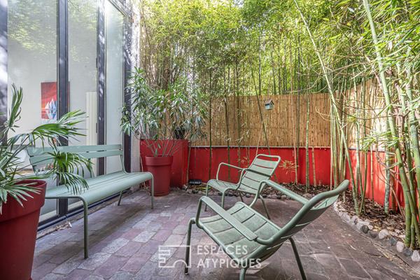 Loft en duplex avec terrasse arborée