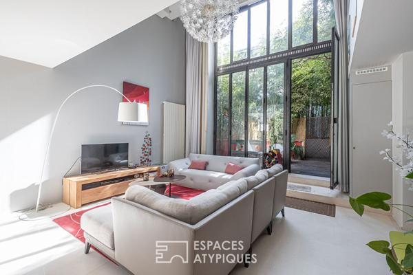 Loft en duplex avec terrasse arborée