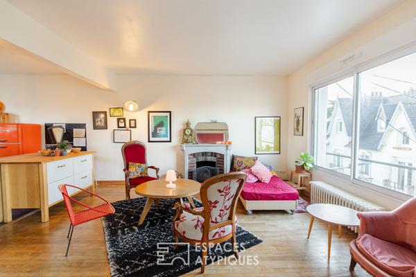 Duplex inspirant avec cheminée et jardin partagé