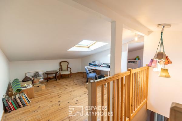 Duplex inspirant avec cheminée et jardin partagé