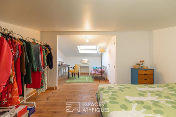 Duplex inspirant avec cheminée et jardin partagé