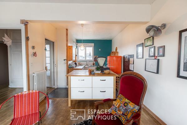 Duplex inspirant avec cheminée et jardin partagé