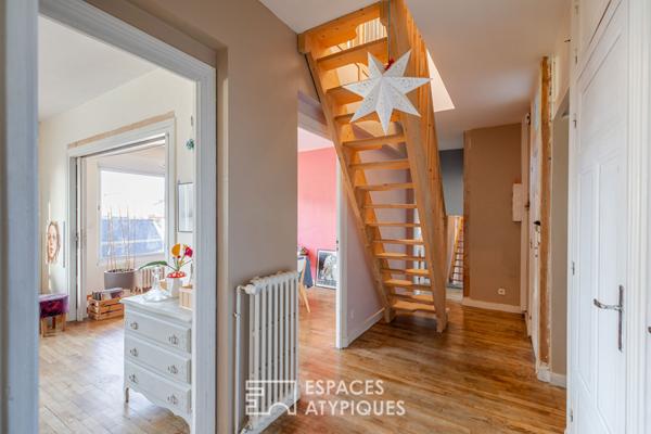 Duplex inspirant avec cheminée et jardin partagé