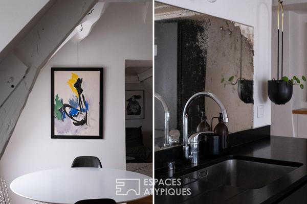 Dernier étage lumineux avec vue sur les toits de Paris