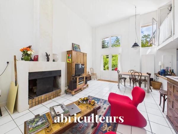 Duplex de caractère de 93 m² avec extérieur et beaux volumes