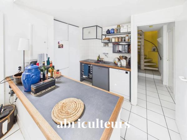 Duplex de caractère de 93 m² avec extérieur et beaux volumes