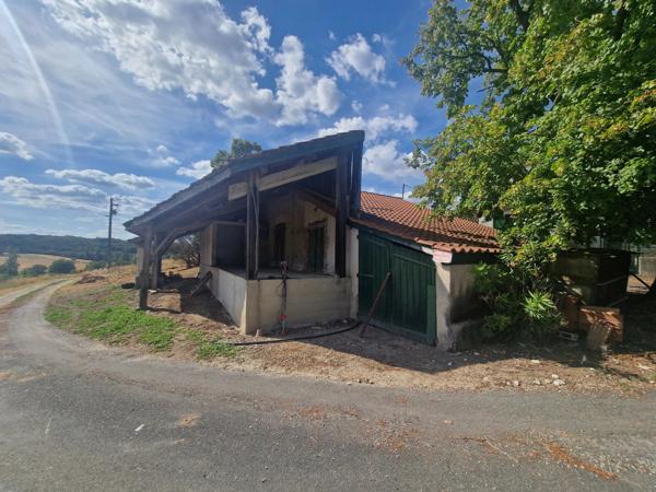 Ancienne ferme en pierre avec vue panoramique à proximité de Monflanquin