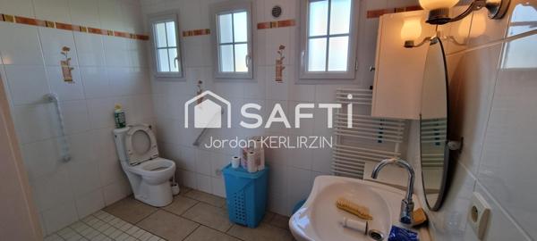 Maison de 123m², terrain de 2000m², 3 chambres, 5 pièces.