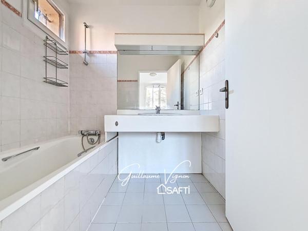 T2 résidence calme et arborée proche commerces