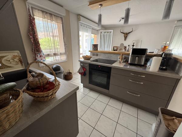 CLUSES - Appartement T3 loué - 65,76 m2 + cave + garage + pl