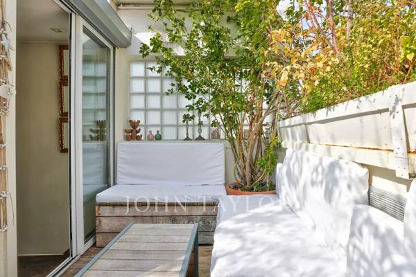Appartement en dernier étage avec terrasse en plein cœur de Saint-Germain-des-Prés