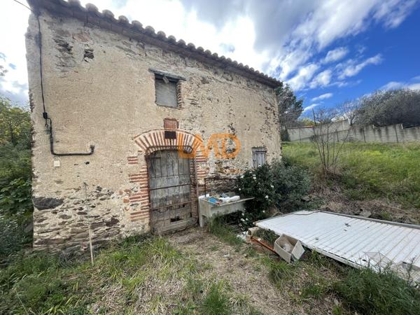 Terrain à bâtir de 881 m2 avec grange de 40 m2 au sol viabilisée
