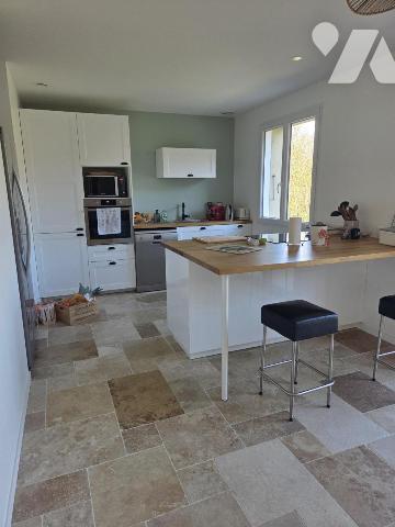 Maison d'habitation avec terrain attenant.