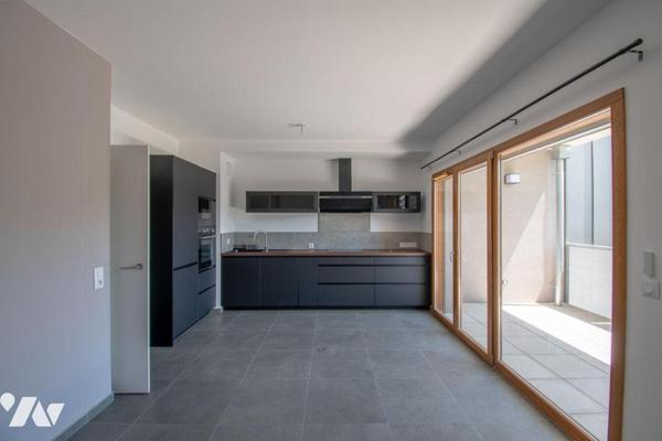 APPARTEMENT TRES RECENT A PROXIMITE DU CENTRE BOURG