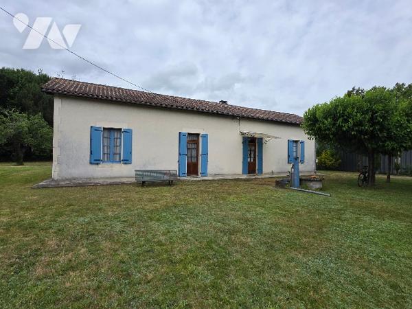Maison familiale de 120 m² de plain-pied avec double garage et jardin