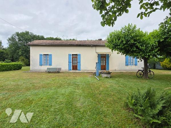 Maison familiale de 120 m² de plain-pied avec double garage et jardin