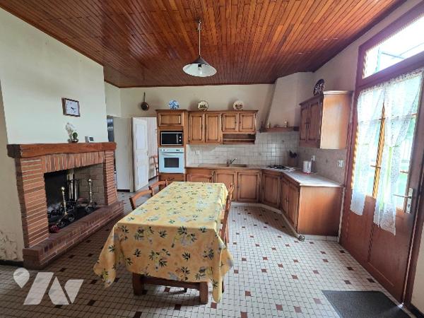 Maison familiale de 120 m² de plain-pied avec double garage et jardin