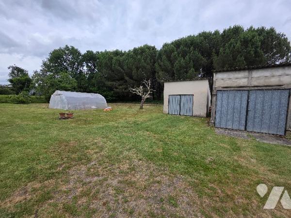Maison familiale de 120 m² de plain-pied avec double garage et jardin