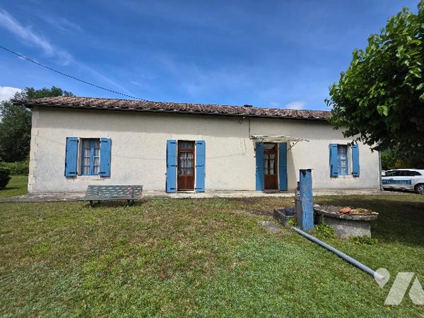 Maison familiale de 120 m² de plain-pied avec double garage et jardin