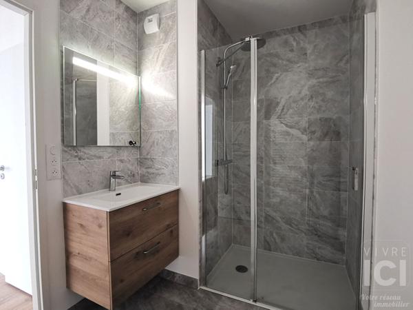Appartement bourg Treillières 3 pièce(s) 61 m2 avec balcon et double garage