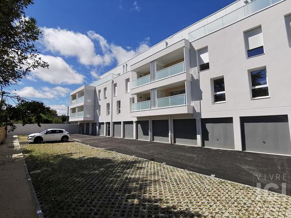 Appartement bourg Treillières 3 pièce(s) 61 m2 avec balcon et double garage