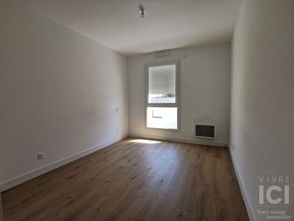 Appartement bourg Treillières 3 pièce(s) 61 m2 avec balcon et double garage