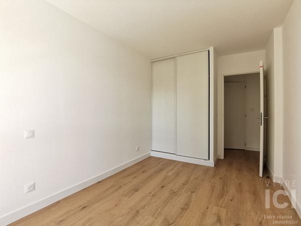 Appartement bourg Treillières 3 pièce(s) 61 m2 avec balcon et double garage
