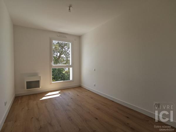 Appartement bourg Treillières 3 pièce(s) 61 m2 avec balcon et double garage