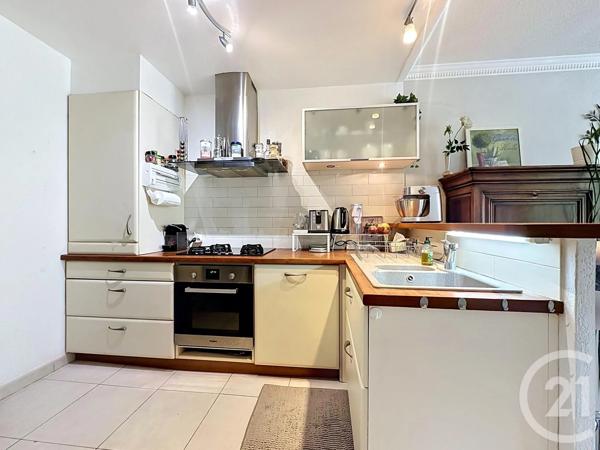 Appartement F3 à vendre  3 pièces - 75 m 2   MOUGINS  - 06