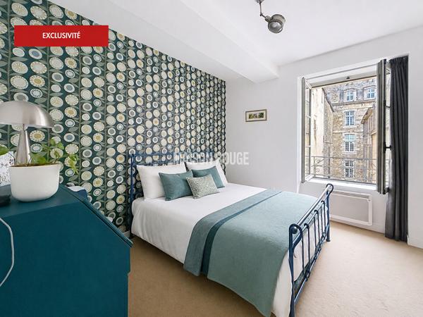 Appartement T3 à Saint-Malo Intra-Muros avec balcon, vue château et charme de l'ancien