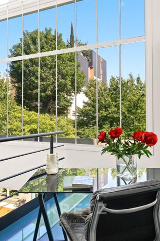 Paris XIV — Maison-atelier d’artistes avec 500m2 de jardin paysager et atelier indépendant