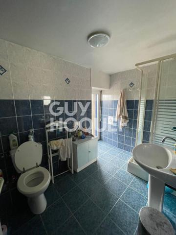 À vendre Local commercial + Appartement en duplex, centre de Baud