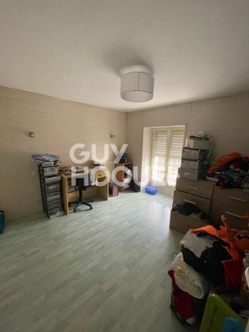 À vendre Local commercial + Appartement en duplex, centre de Baud