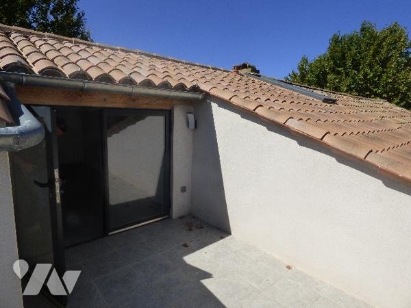 RARE- spacieux duplex avec vue situé au coeur du village et  à proximité des commerces,