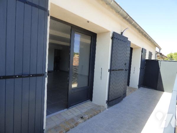 RARE- spacieux duplex avec vue situé au coeur du village et  à proximité des commerces,