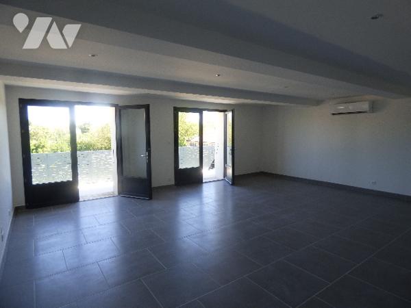 RARE- spacieux duplex avec vue situé au coeur du village et  à proximité des commerces,