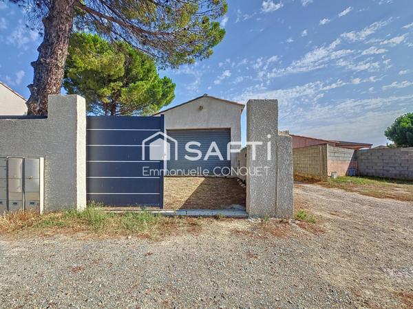 Garage de 50 m² avec jardin clos