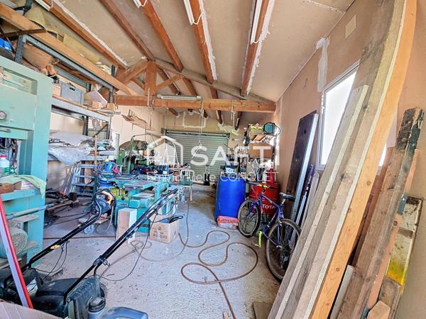 Garage de 50 m² avec jardin clos