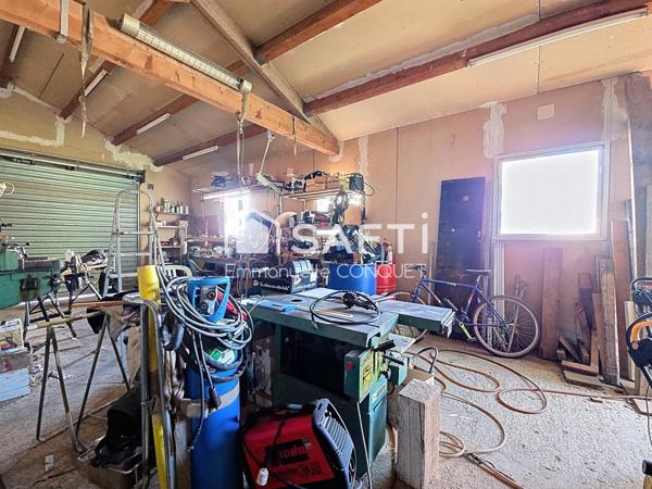 Garage de 50 m² avec jardin clos