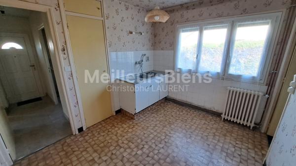 Maison de plain pied / 3 chambres / garage / jardin