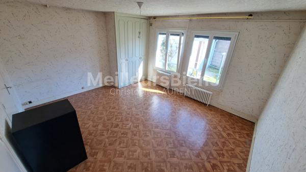 Maison de plain pied / 3 chambres / garage / jardin