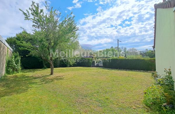 Maison de plain pied / 3 chambres / garage / jardin