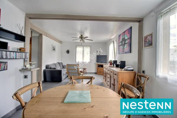 Maison plain-pied de 88m² avec grand terrain de 836m² et garage à Décines-Charpieu