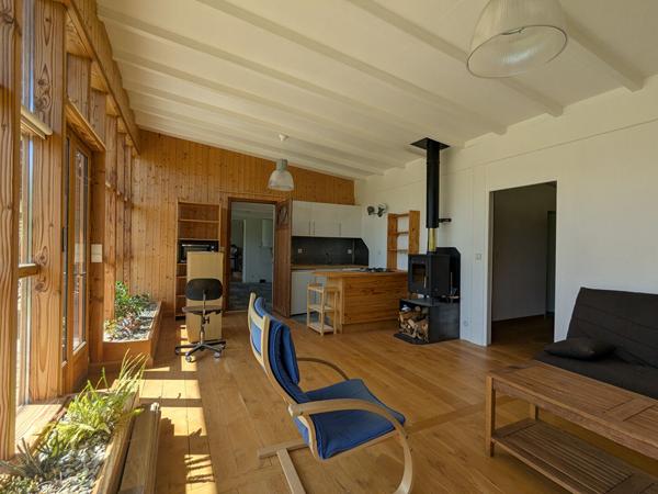 Maison en bois bioclimatique sur grand terrain Camburat