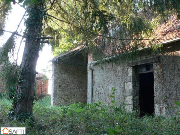 Grange en pierre à rénover sur terrain arboré de plus de 1000m2 à 5 minutes de Beaune La Rolande